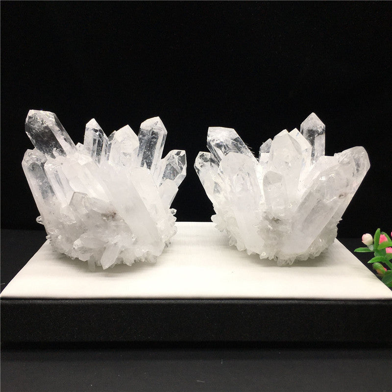 2 clear quartz cluster on display